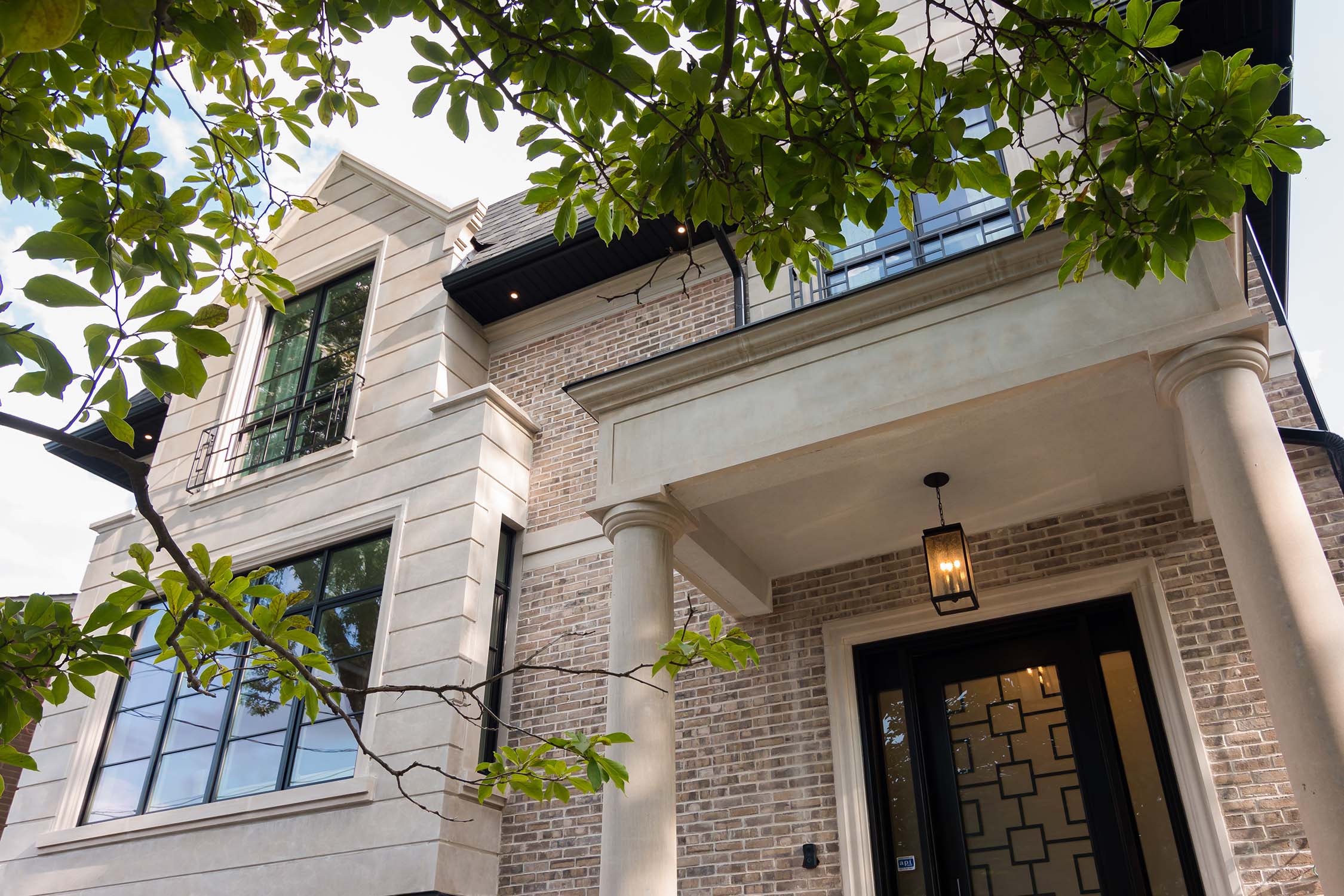 Luxury Custom Home Façade – Brick and Limestone | Qarnis Development